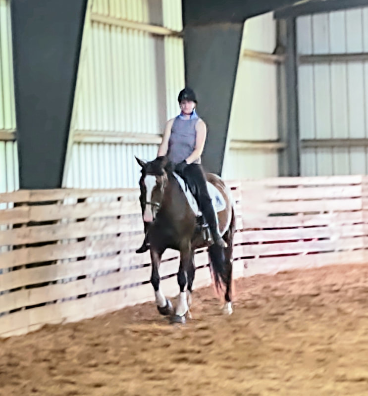 Brea giving lesson without stirrups